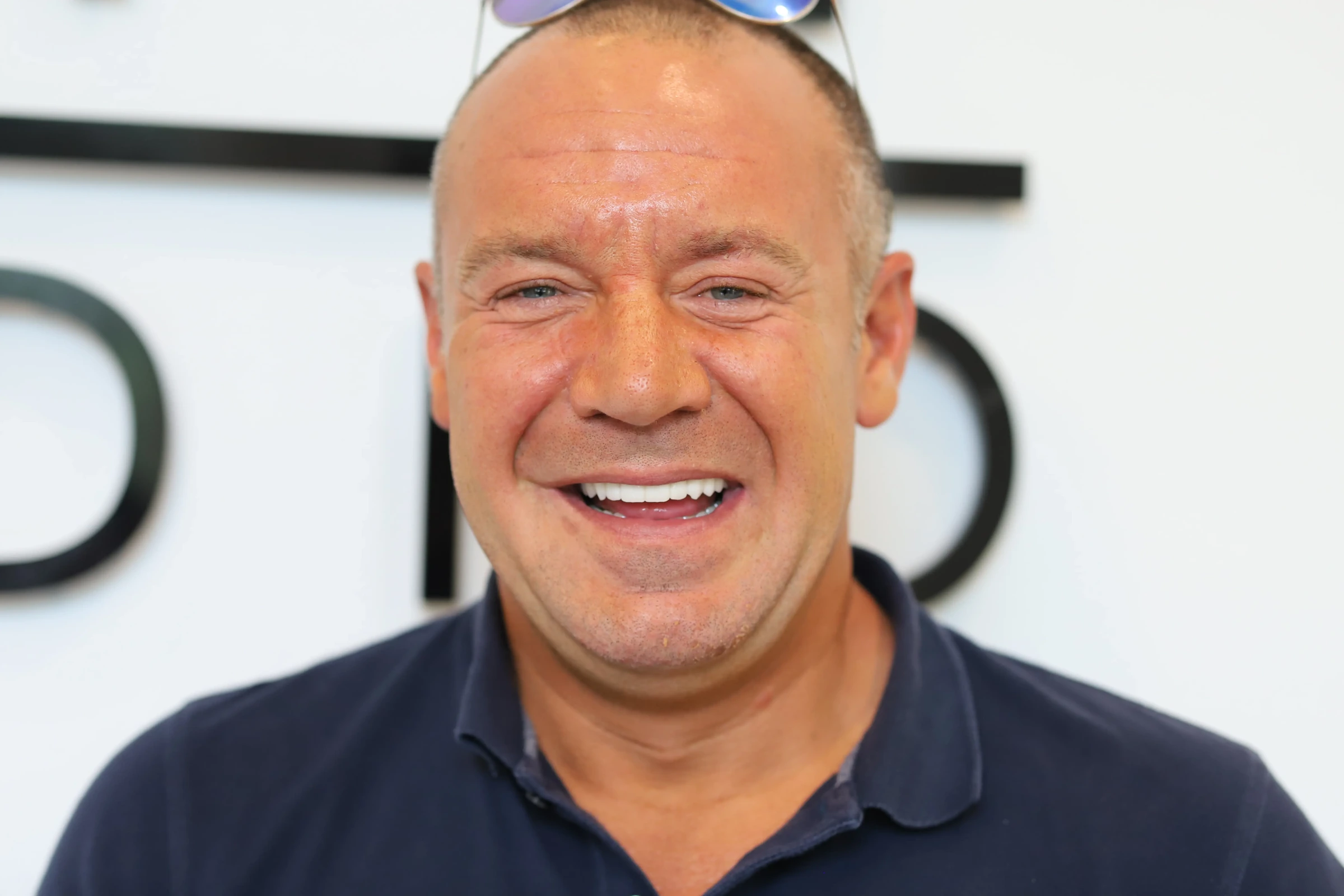 Patient smile after implant restoration